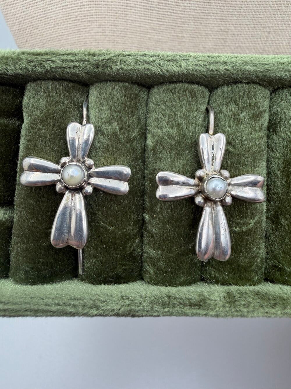 sterling silver cross earrings featuring a central white pearl